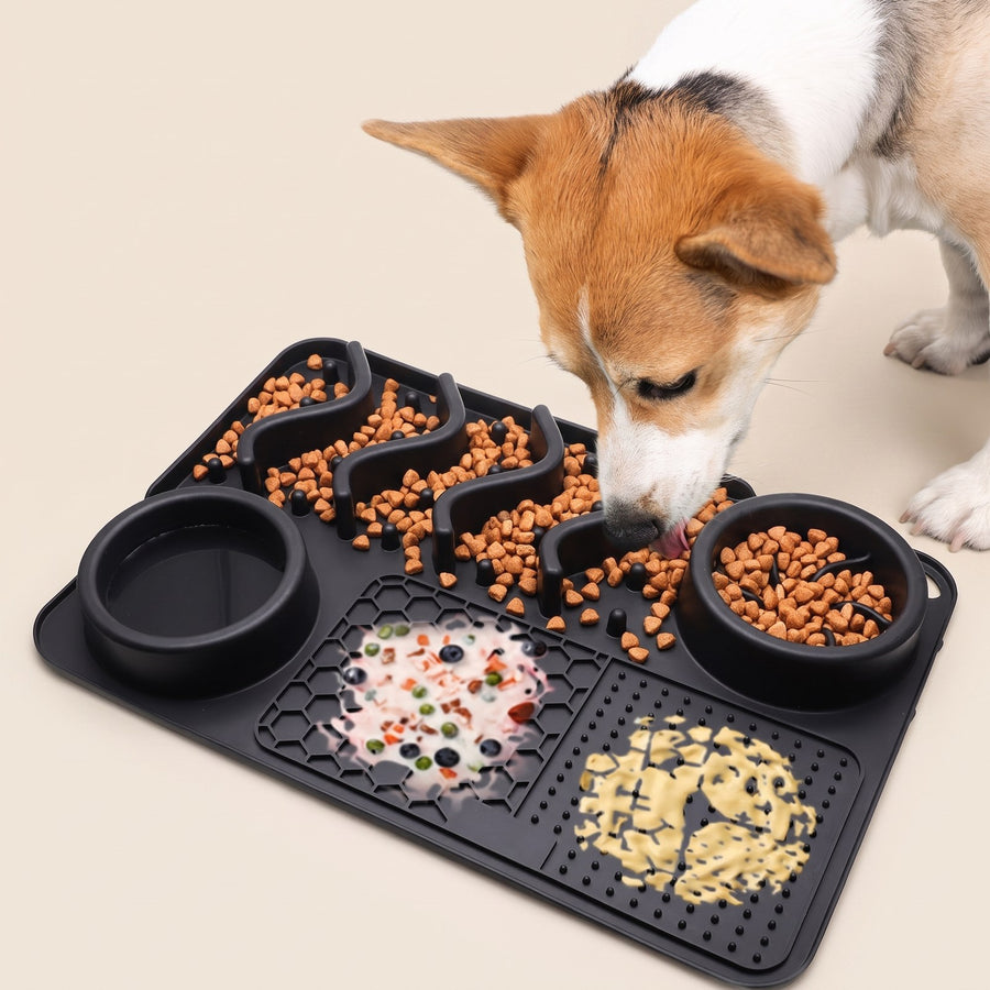 Dog licking food from silicone lick mat